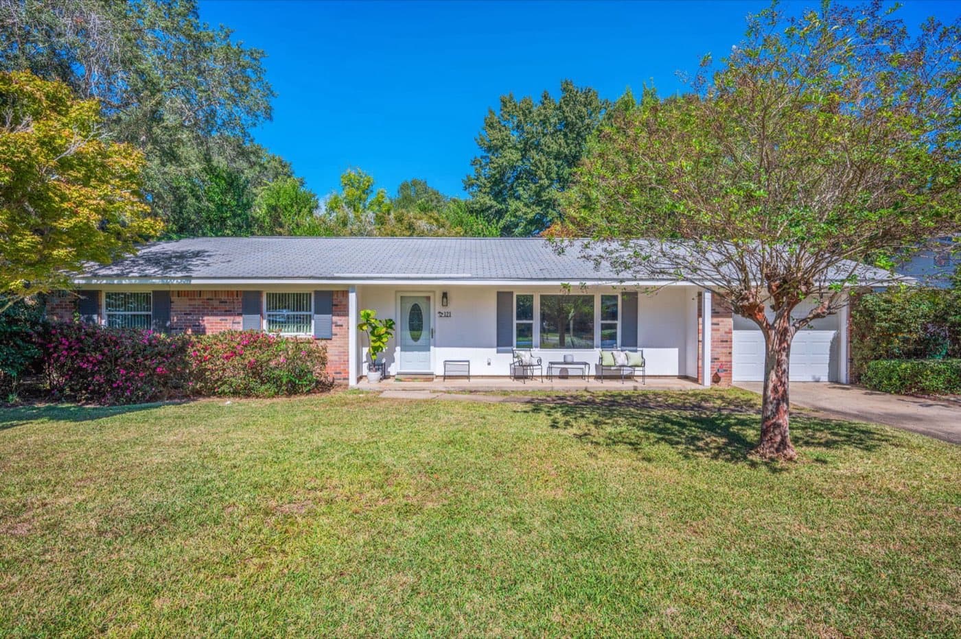 Finished shingle roof replacement on a Pace, FL brick ranch by Whitrock Associates