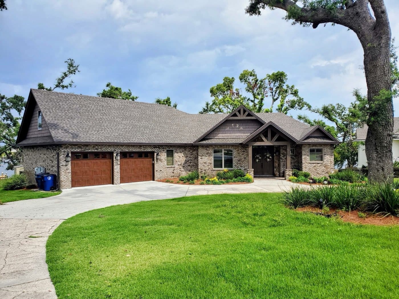 Home with a new architectural shingle roof in Northwest Florida by Whitrock Associates