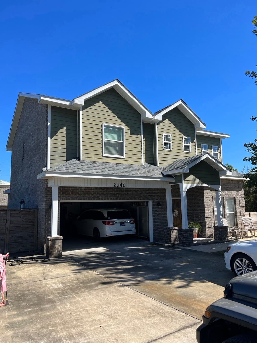 Completed two-story shingle roof in the Milton, FL area by Whitrock Associates