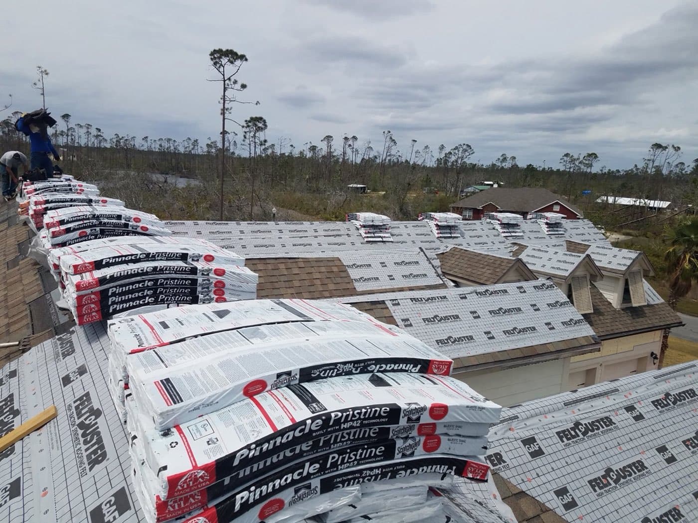 Post-storm roof replacement in progress in Panama City, FL by Whitrock Associates