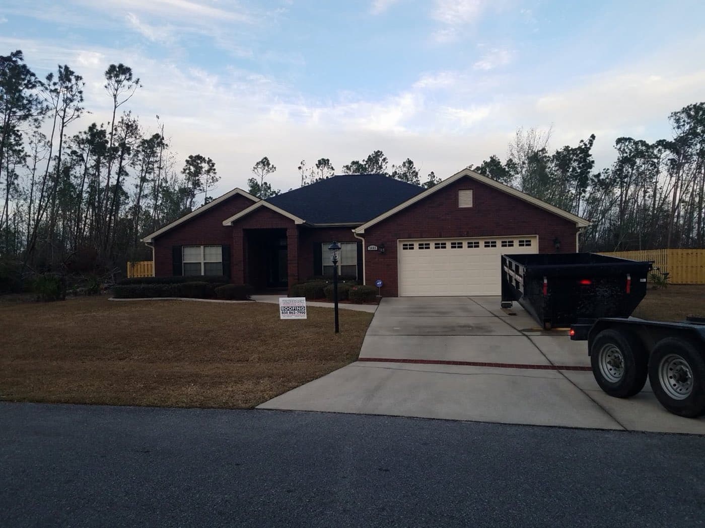 New architectural shingle roof on a Milton, FL brick home by Whitrock Associates